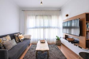 A television and/or entertainment centre at La Minilla Suite
