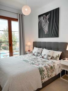 Postel nebo postele na pokoji v ubytování Villa escandinava con vistas preciosas al Golf