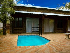 Πισίνα στο ή κοντά στο Fire and Ice Guesthouse Lephalale