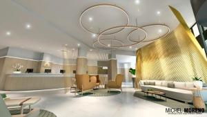 a lobby with a couch and a chandelier at Maravilhoso Flat em Frente ao Aeroporto de Congonhas H1908 in Sao Paulo