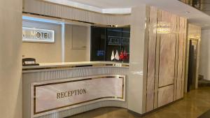 Lobbyn eller receptionsområdet på ALFİN OTEL