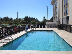 a swimming pool on the side of a building at Hampton Inn Saint Augustine-I-95 in Saint Augustine +5 photos