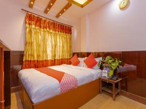 OYO 800 New Muktinath Hotel 객실 침대