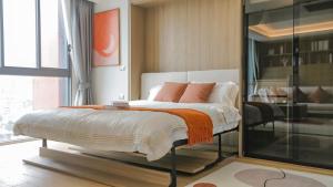 Katil atau katil-katil dalam bilik di Funstay Bangkok Circle Condo