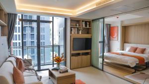 Televisyen dan/atau pusat hiburan di Funstay Bangkok Circle Condo