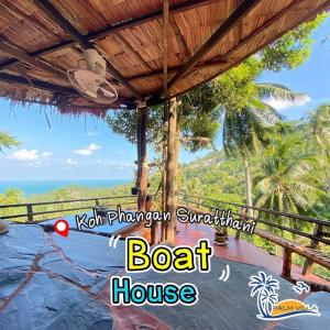 a boat house with a view of the ocean at Sea View Palm Villa - Tree House in Haad Yao
