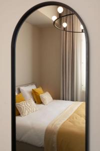 Postel nebo postele na pokoji v ubytování Boutique Hotel Kint