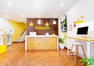 an office with a desk and a sign that reads bloom at Bloom Hotel - Heritage Walk in Amritsar