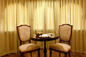 Χώρος καθιστικού στο Hotel Chandra Raj Mahal