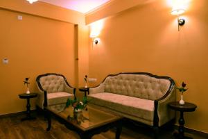 Χώρος καθιστικού στο Hotel Chandra Raj Mahal