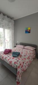Ліжко або ліжка в номері Casa di Nalo'