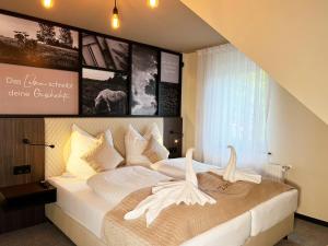 Postel nebo postele na pokoji v ubytování Hotel Da Toni