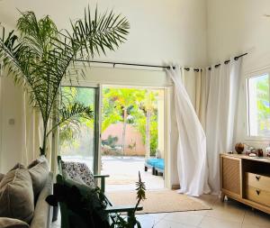 Posezení v ubytování Villa Ti MoOn, Piscine et SPA idéalement situé, Sud Réunion