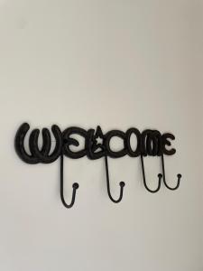 a sign that says awesome written in blackletters at The Roost and The Nook Rural Barn Stays in Quadring
