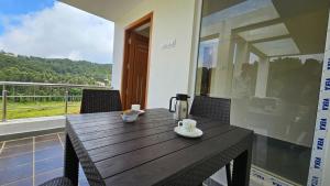 Balkón nebo terasa v ubytování TIO -THE INDIAN ORIGIN HOTELS & RESORTS - Yercaud