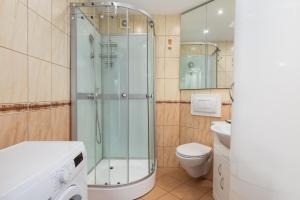 Kúpeľňa v ubytovaní Comfy Apartments with Balcony Turystyczna Międzyzdroje by Noclegi Renters