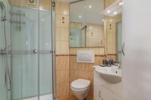 Kúpeľňa v ubytovaní Comfy Apartments with Balcony Turystyczna Międzyzdroje by Noclegi Renters