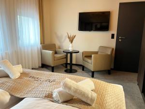 TV a/nebo společenská místnost v ubytování Hotel Da Toni