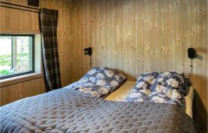 Postel nebo postele na pokoji v ubytování 4 Bedroom Nice Home In Tuddal