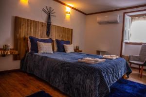 Uma cama ou camas num quarto em Casa da Cerca