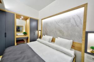 a bedroom with a large bed and a window at North Blue Life in Istanbul