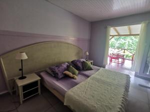 Voodi või voodid majutusasutuse Gîte 1001 Nuits - SHERAZADE toas