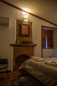 Uma cama ou camas num quarto em Casa da Cerca