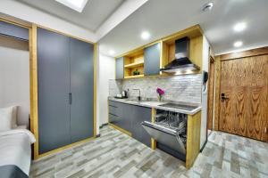 a kitchen with a sink and a counter top at North Blue Life in Istanbul