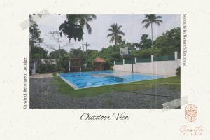 a picture of a swimming pool with a basketball hoop at Casita Villa at Alfonso Cavite 