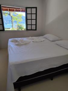 Hotel Ribeira Beachにあるベッド