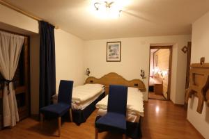 Voodi või voodid majutusasutuse Albergo Centrale toas