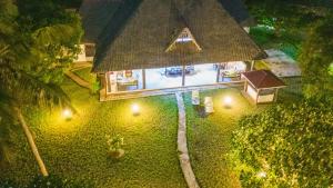 Κήπος έξω από το Lux Suites kivulini Cottages Diani Beach