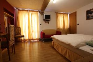 Voodi või voodid majutusasutuse Albergo Centrale toas
