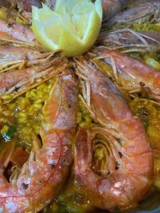 a group of shrimp with a lemon on top at VILLA SOFIA in Valldemossa