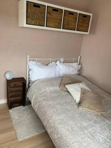 Postel nebo postele na pokoji v ubytování Appartement aan het strand in Zandvoort aan Zee!