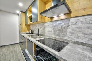 a kitchen with a sink and a counter at North Blue Life in Istanbul