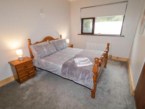 Postel nebo postele na pokoji v ubytování Drumore House