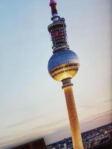 a view of a tv tower in a city at West Side Story - 4 People in Berlin