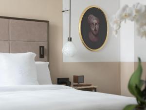 Letto o letti in una camera di San Domenico Palace, Taormina, A Four Seasons Hotel