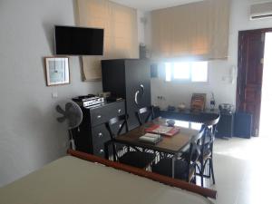 TV a/nebo společenská místnost v ubytování STUDIO AU COEUR de CARTHAGE HANNIBAL + 6 fotografií