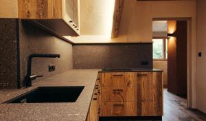 a kitchen with a sink and a counter top at Obertimpflerhof Wohnung Lola in Verano