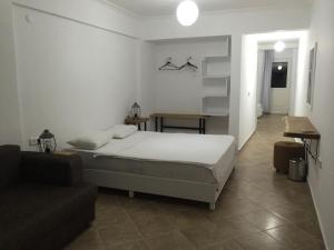Postel nebo postele na pokoji v ubytování Pataros Hotel