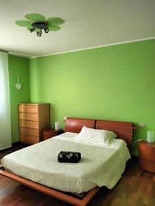 Postel nebo postele na pokoji v ubytování Dimora Poderina Cod Z01019