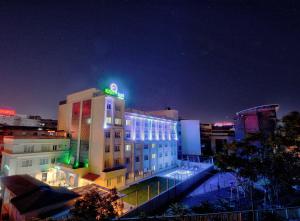 a building with a green light on top of it at North Blue Life in Istanbul