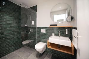 Koupelna v ubytování Tailormade Hotel BAB Bachenbülach