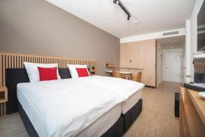 Kuchyň nebo kuchyňský kout v ubytování Tailormade Hotel BAB Bachenbülach