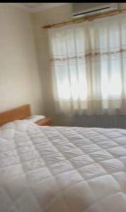 Katil atau katil-katil dalam bilik di Hotel restaurante Palacio Fes