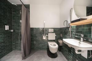 Koupelna v ubytování Tailormade Hotel BAB Bachenbülach