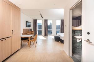 Kuchyň nebo kuchyňský kout v ubytování Tailormade Hotel BAB Bachenbülach