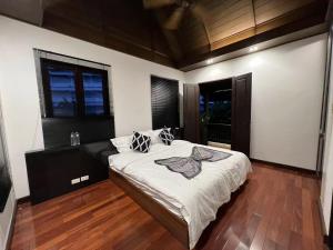Postel nebo postele na pokoji v ubytování Bangkok City Centre Luxurious Villa